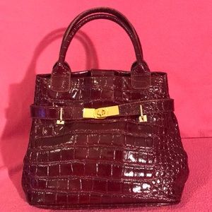 Muska ptn leather  rich cranberry color medium bag